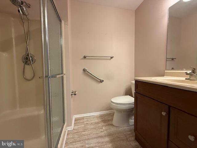 1201 Ginger Court Mount Laurel, NJ 08054 - Photo 13 of 18 a bathroom with a granite countertop toilet a sink and a mirror