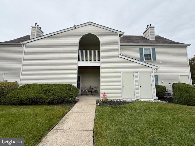 1201 Ginger Court Mount Laurel, NJ 08054 - Photo 15 of 18 a front view of a house with a garden