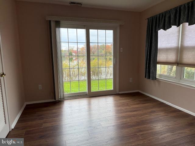 1201 Ginger Court Mount Laurel, NJ 08054 - Photo 9 of 18 a view of an empty room with wooden floor and a window