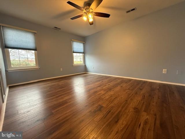 1201 Ginger Court Mount Laurel, NJ 08054 - Photo 10 of 18 an empty room with wooden floor fan and windows