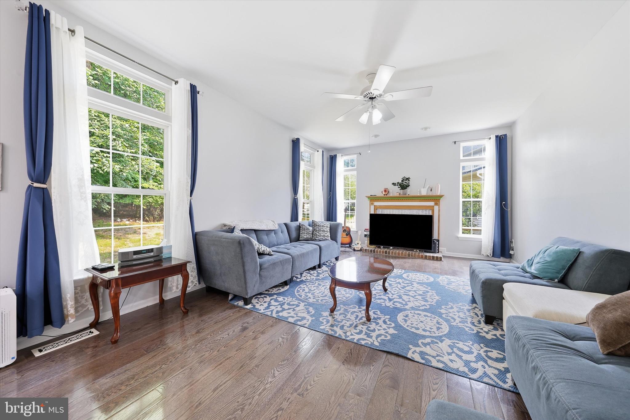 6440 Spring Forest Road Frederick, MD 21701 - Photo 15 of 48 Family Room with Wood Burning Fireplace