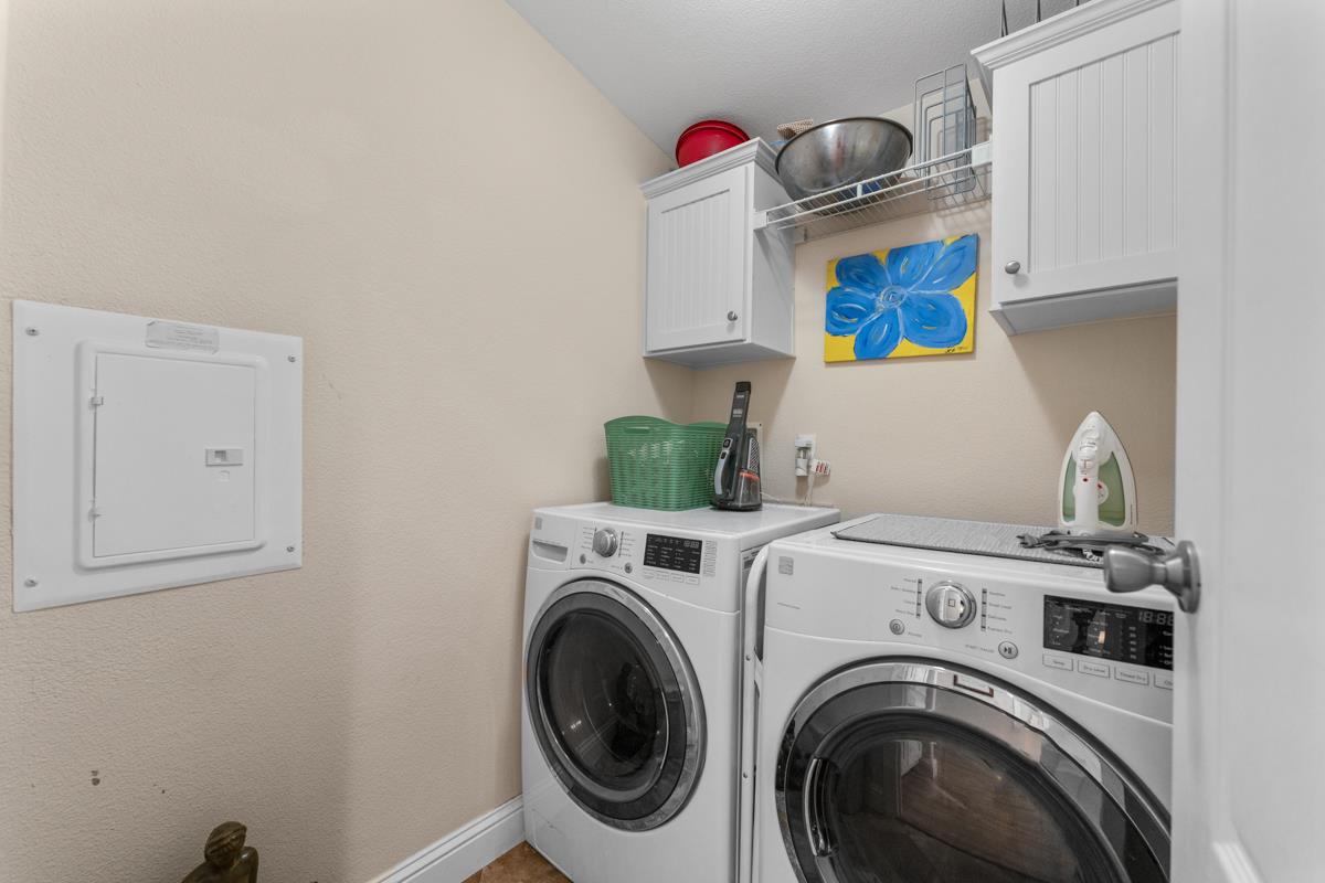 128 Don Felipe Ojai, CA 93023 - Photo 21 of 35 a utility room with dryer and washer