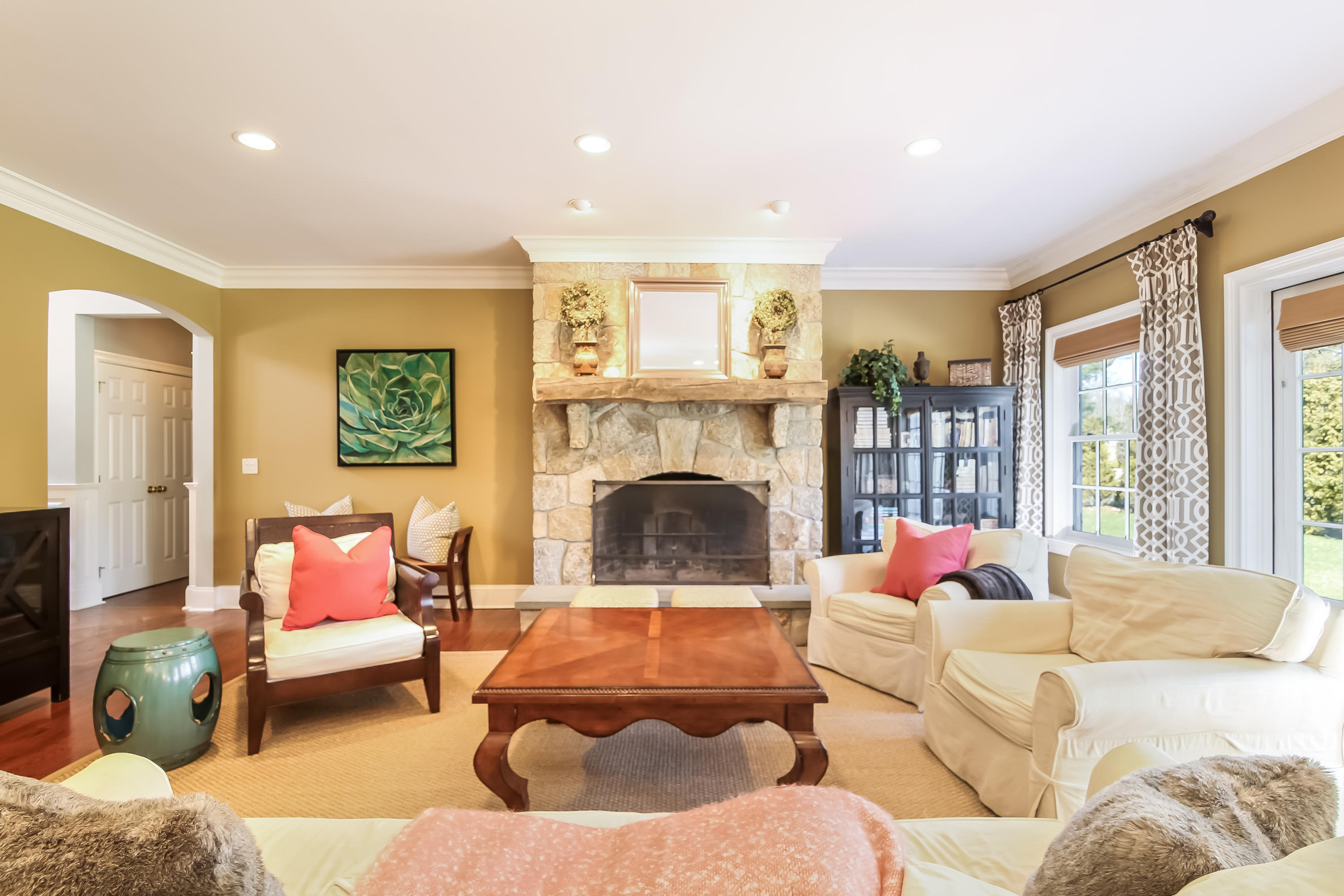 3 Bishops Gate Road Darien, CT 06820 - Photo 12 of 61 a living room with furniture and a fireplace