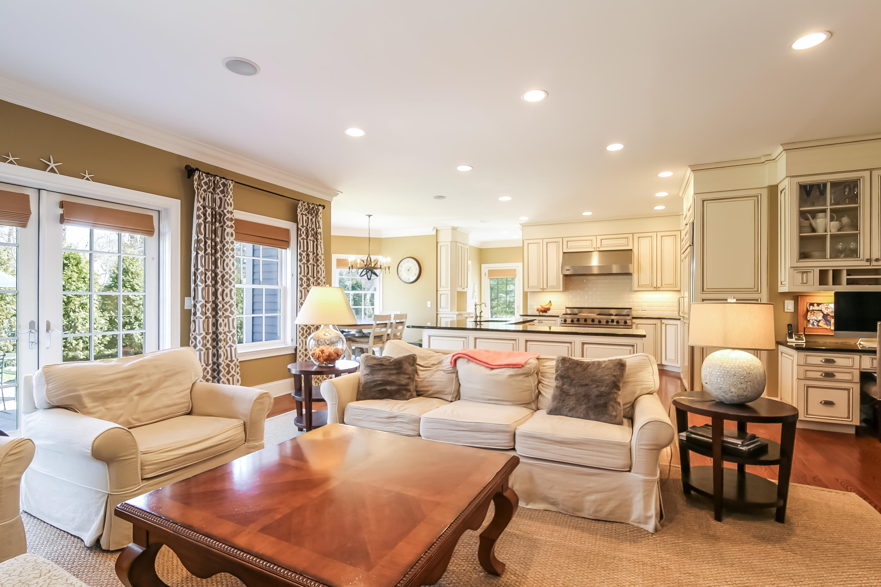 3 Bishops Gate Road Darien, CT 06820 - Photo 13 of 61 a living room with furniture and a large window