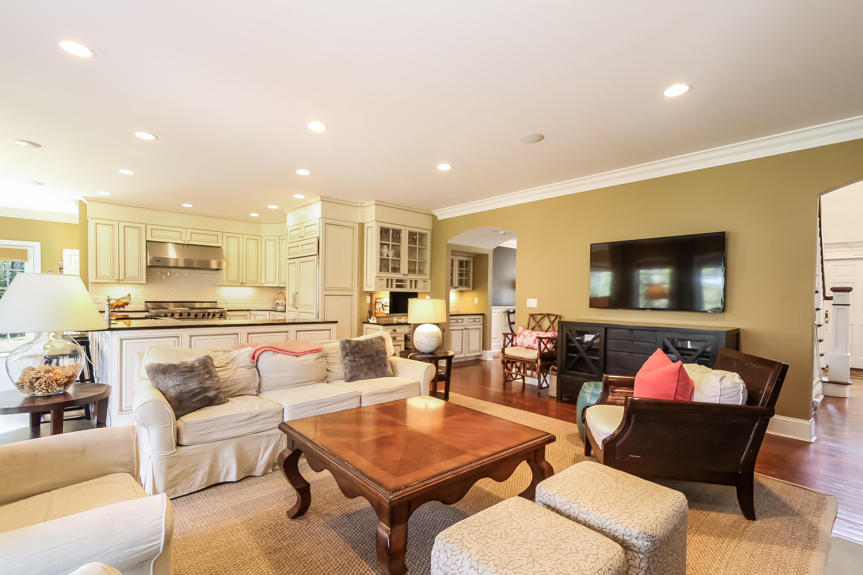 3 Bishops Gate Road Darien, CT 06820 - Photo 14 of 61 a living room with furniture and a flat screen tv