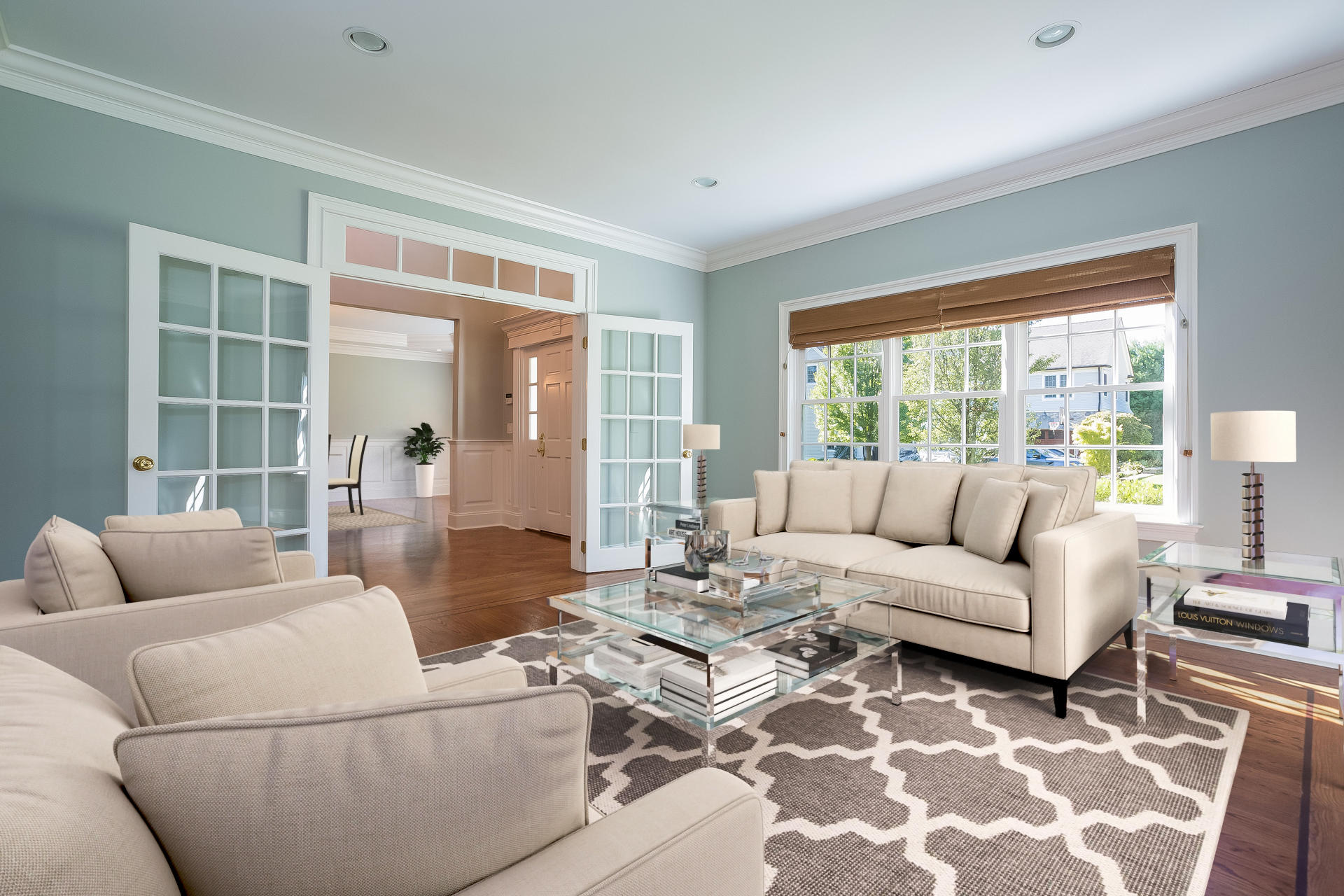 3 Bishops Gate Road Darien, CT 06820 - Photo 3 of 61 a living room with furniture and a large window