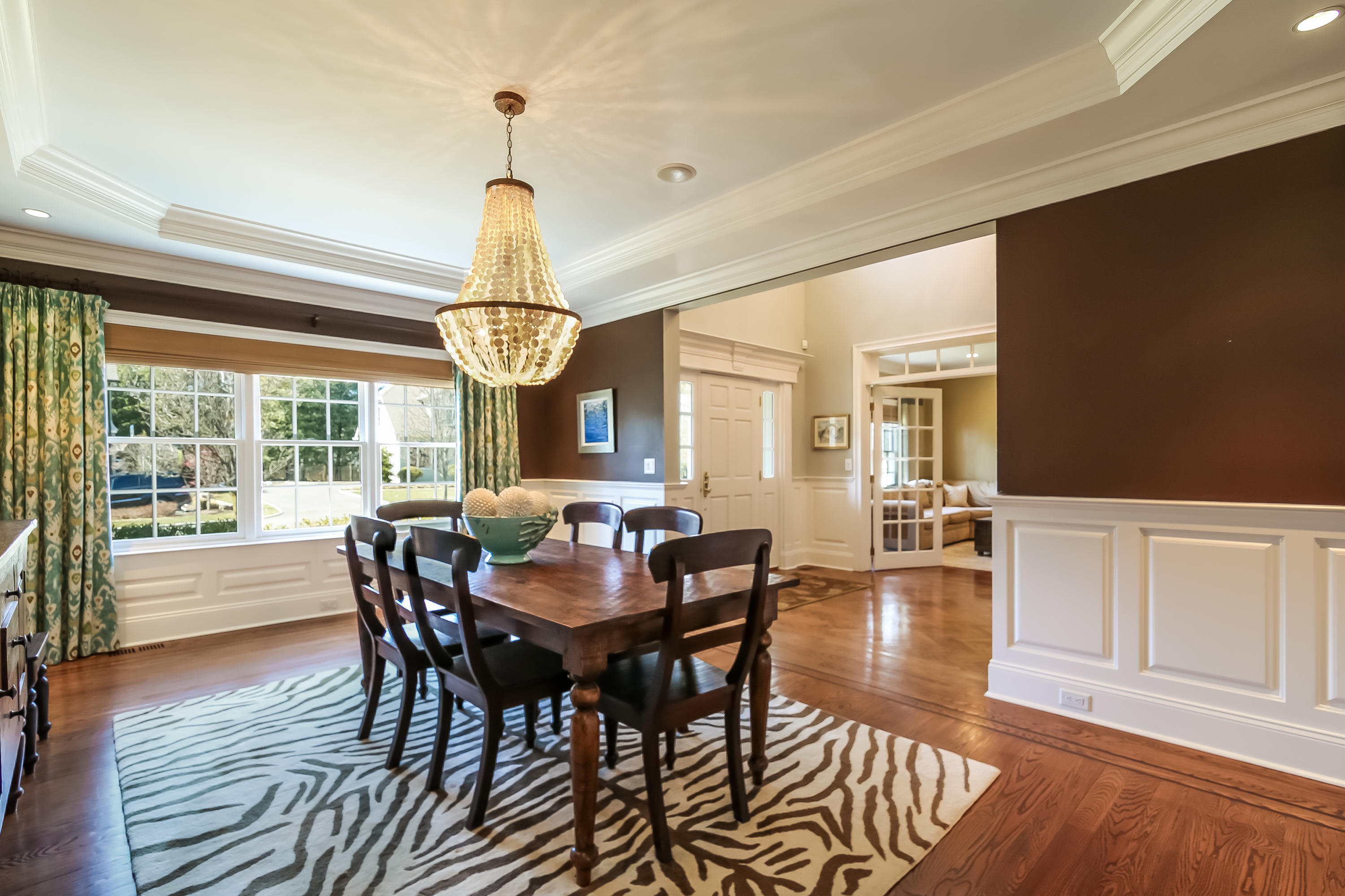 3 Bishops Gate Road Darien, CT 06820 - Photo 21 of 61 a view of a dining room with furniture window and wooden floor