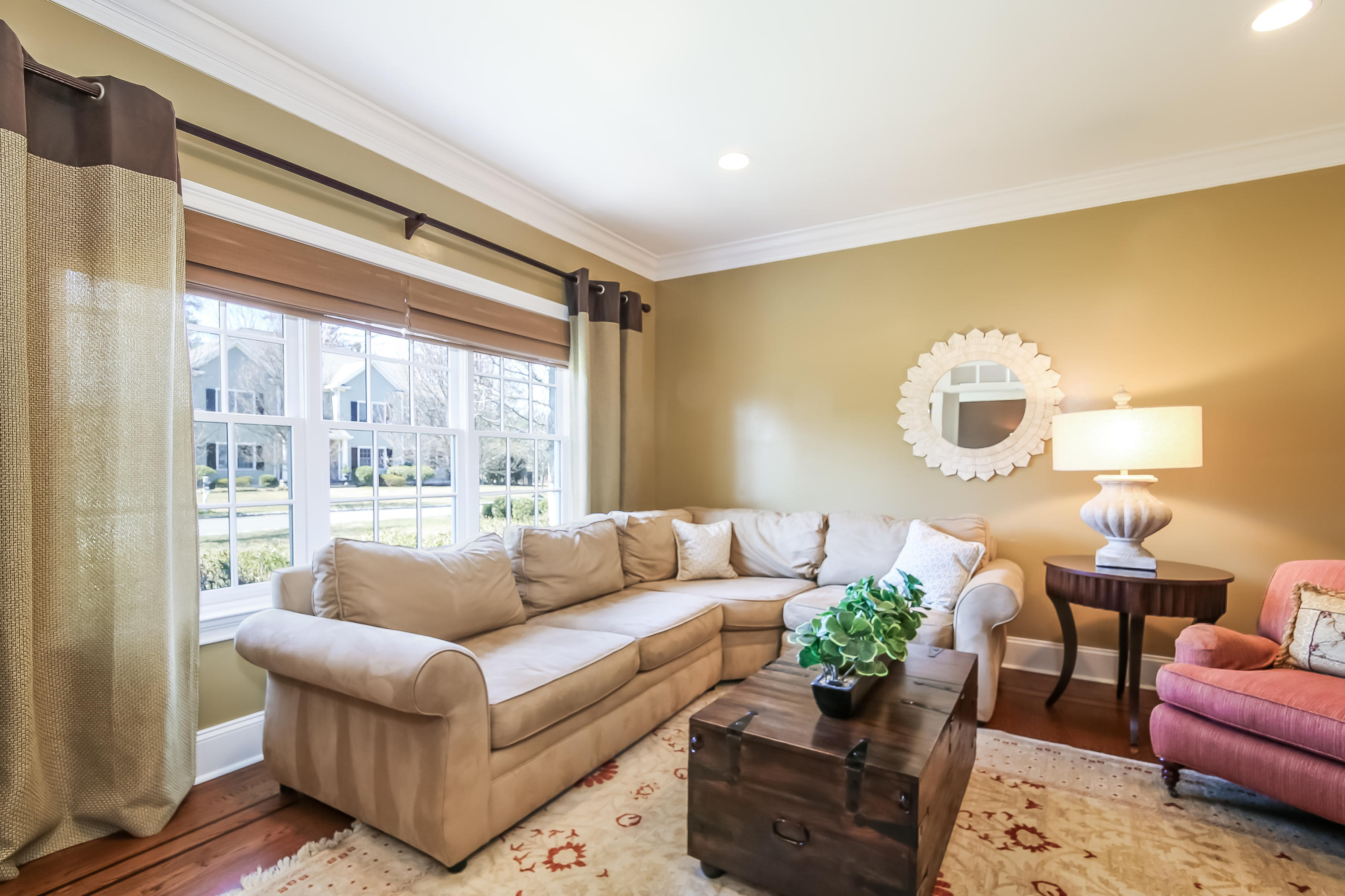 3 Bishops Gate Road Darien, CT 06820 - Photo 24 of 61 a living room with furniture and a large window