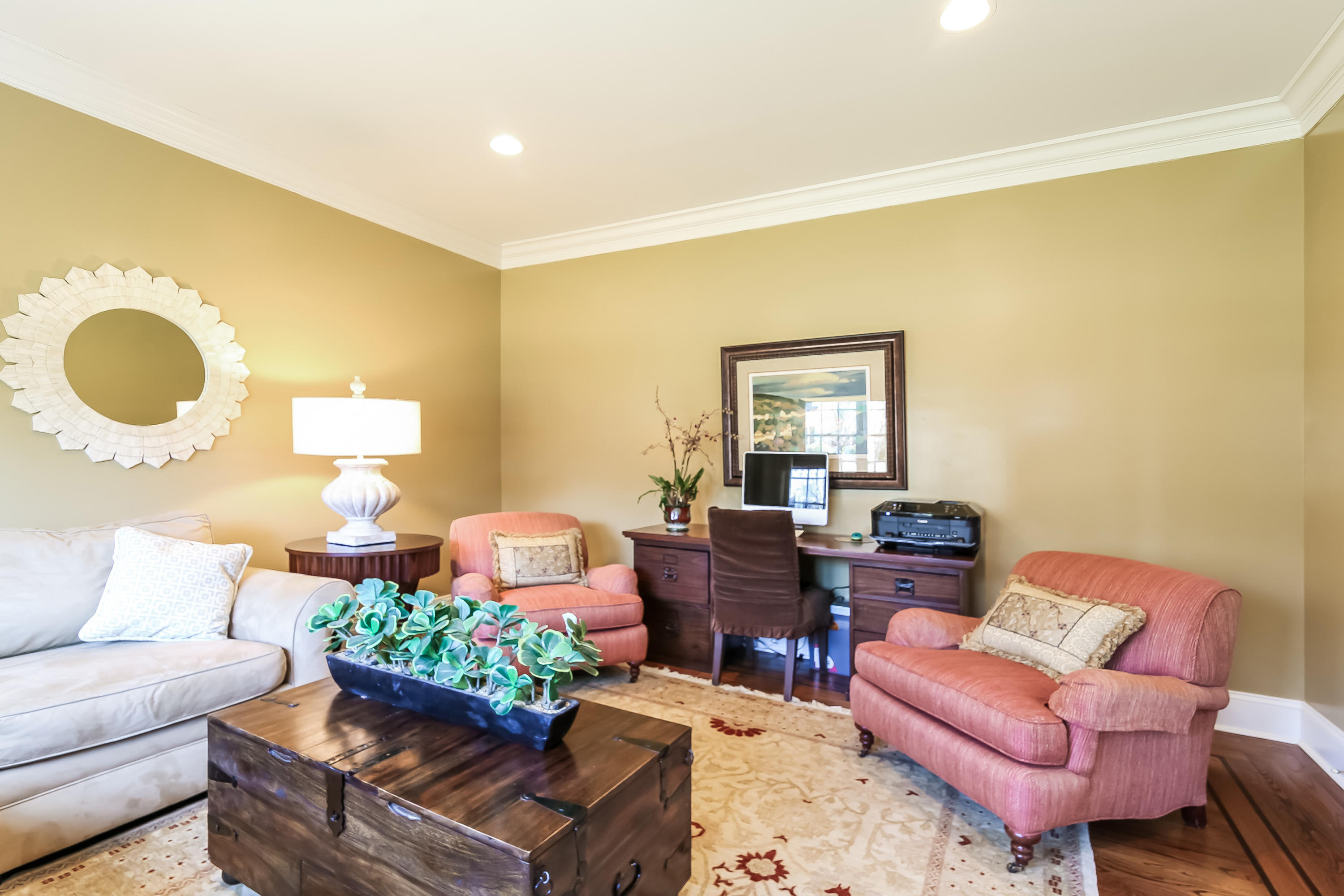 3 Bishops Gate Road Darien, CT 06820 - Photo 25 of 61 a living room with furniture and a mirror