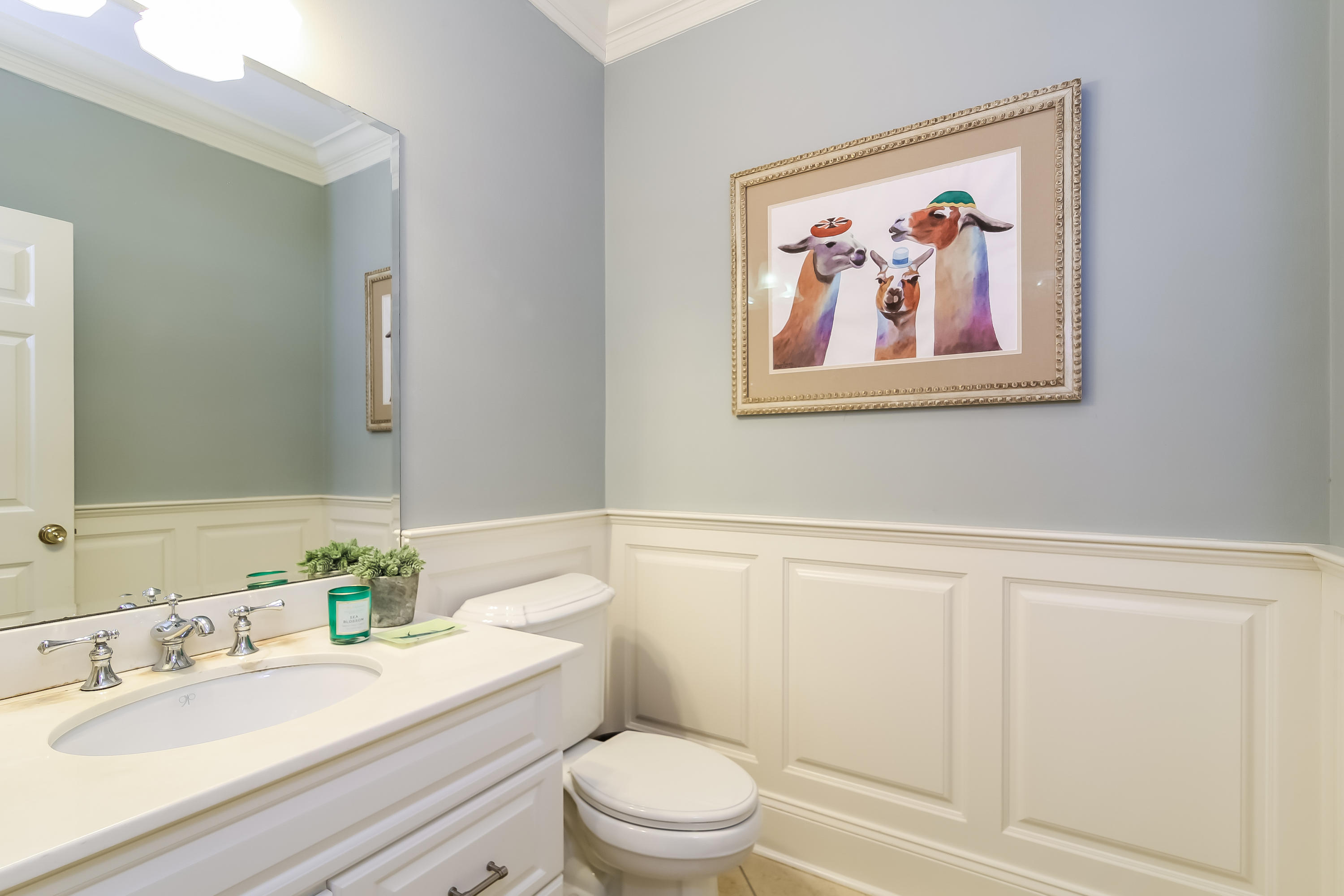 3 Bishops Gate Road Darien, CT 06820 - Photo 26 of 61 a bathroom with a granite countertop toilet a sink and a mirror