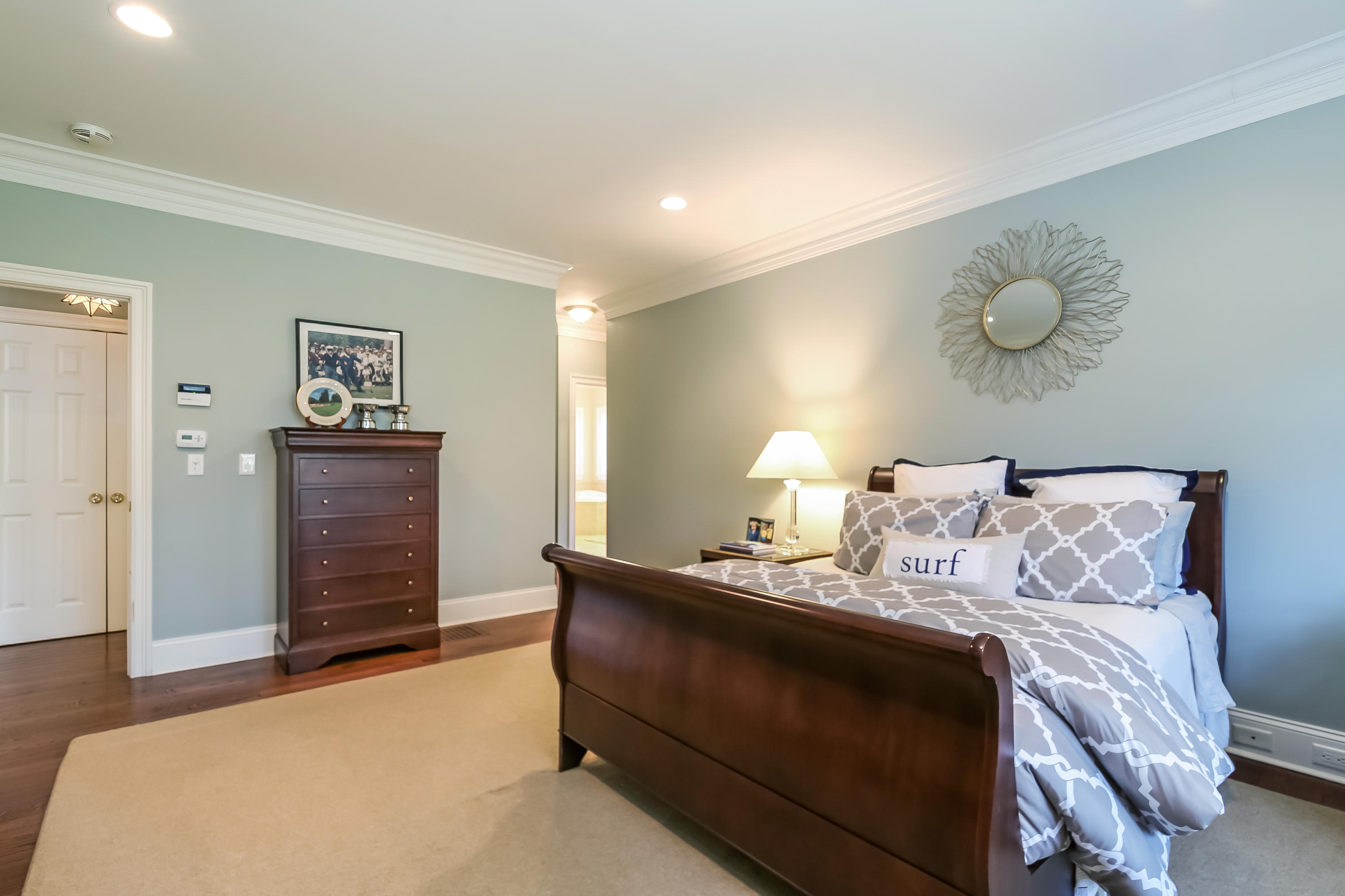 3 Bishops Gate Road Darien, CT 06820 - Photo 28 of 61 a bedroom with a bed and cabinet