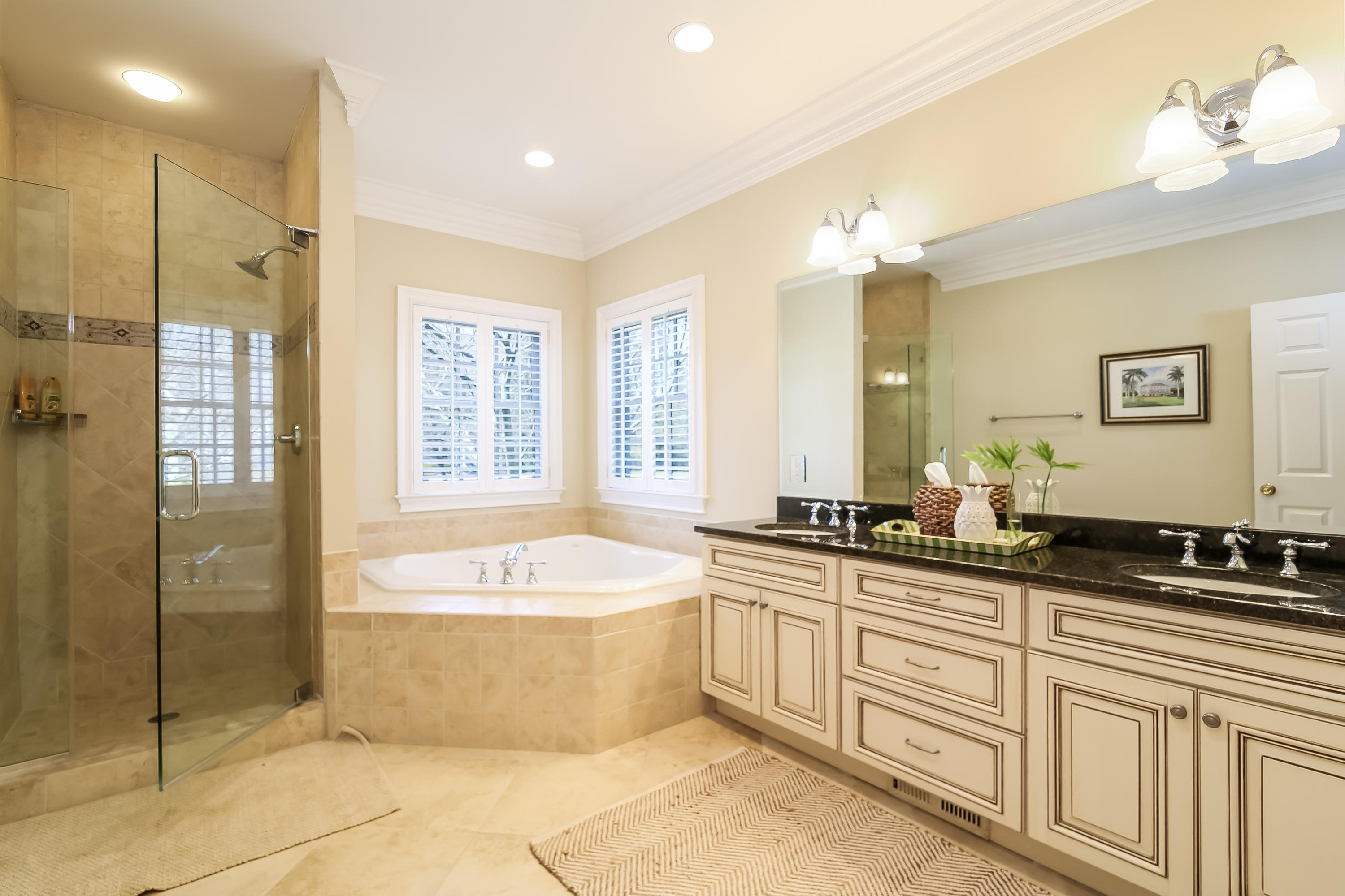 3 Bishops Gate Road Darien, CT 06820 - Photo 29 of 61 a spacious bathroom with a tub sink shower and mirror