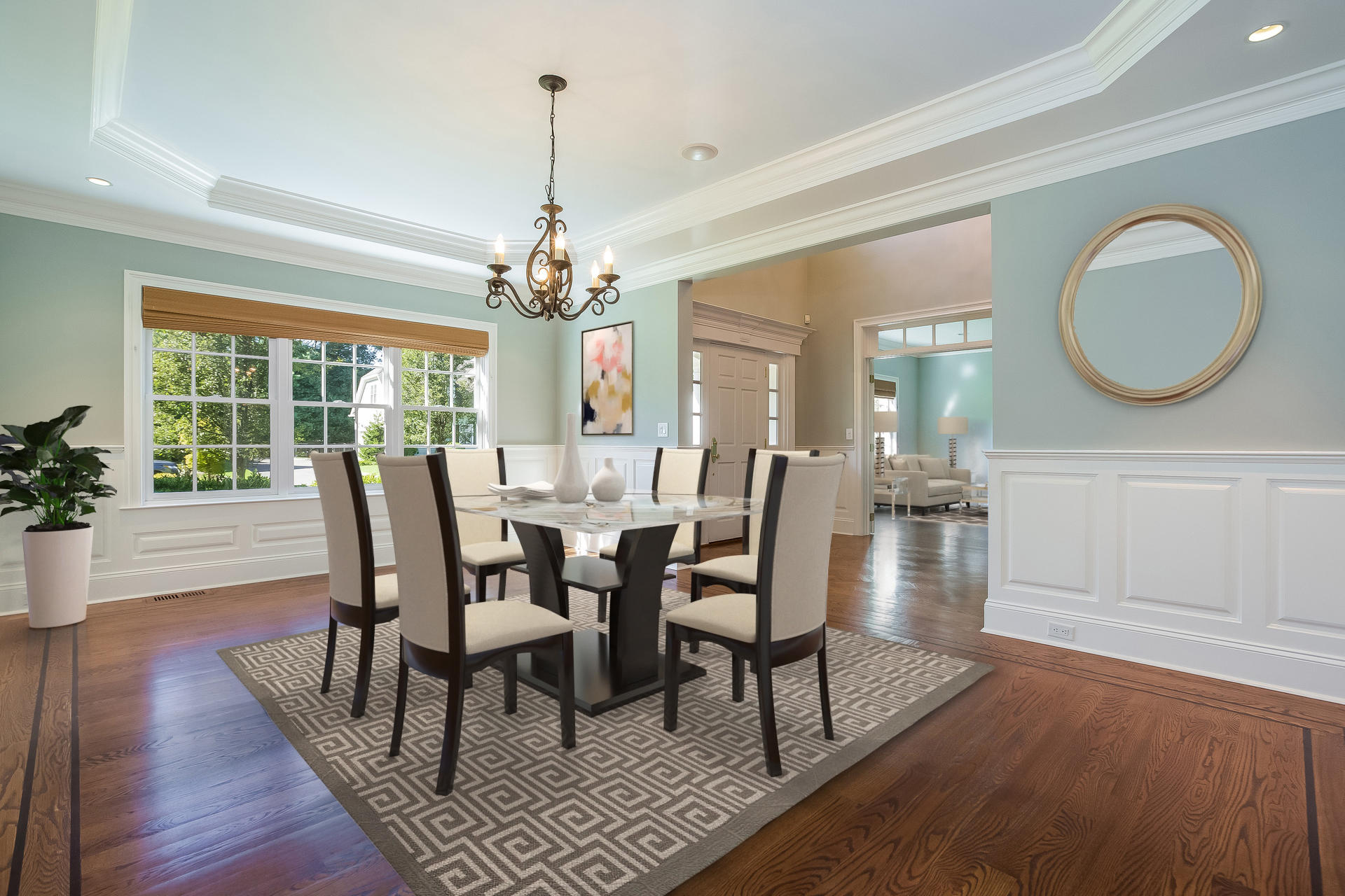 3 Bishops Gate Road Darien, CT 06820 - Photo 4 of 61 a view of a dining room with furniture a chandelier and wooden floor