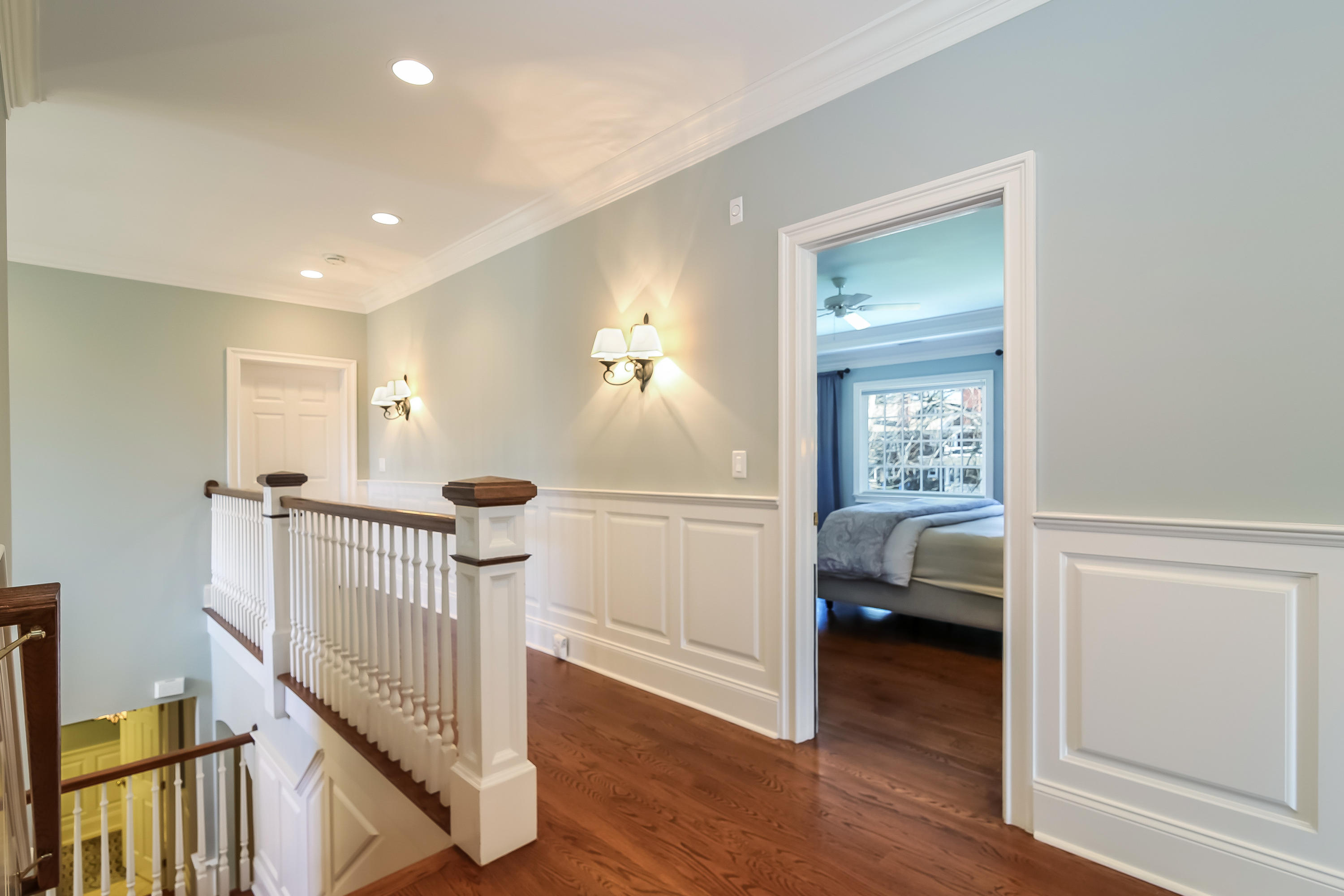 3 Bishops Gate Road Darien, CT 06820 - Photo 31 of 61 a view of a livingroom with a window and stairs