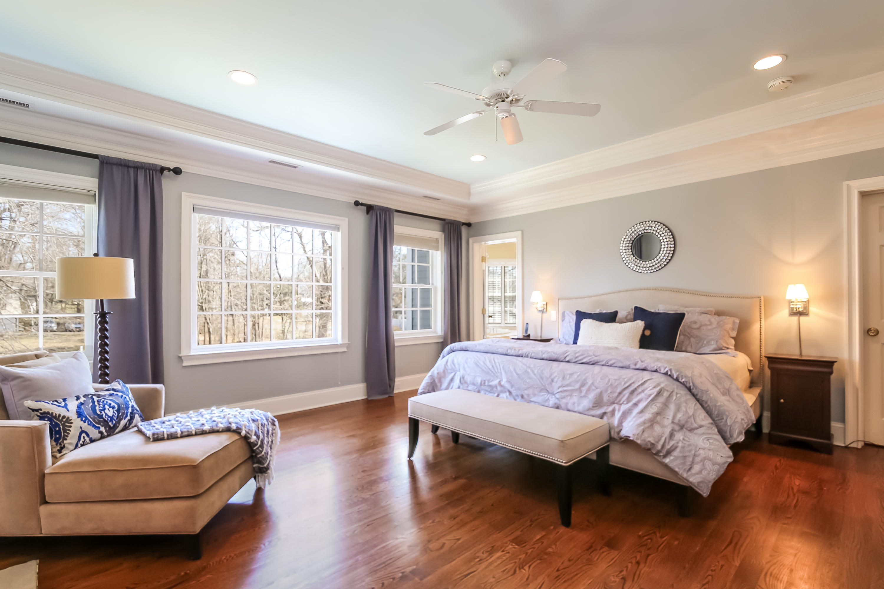 3 Bishops Gate Road Darien, CT 06820 - Photo 34 of 61 a spacious bedroom with a bed and a couch