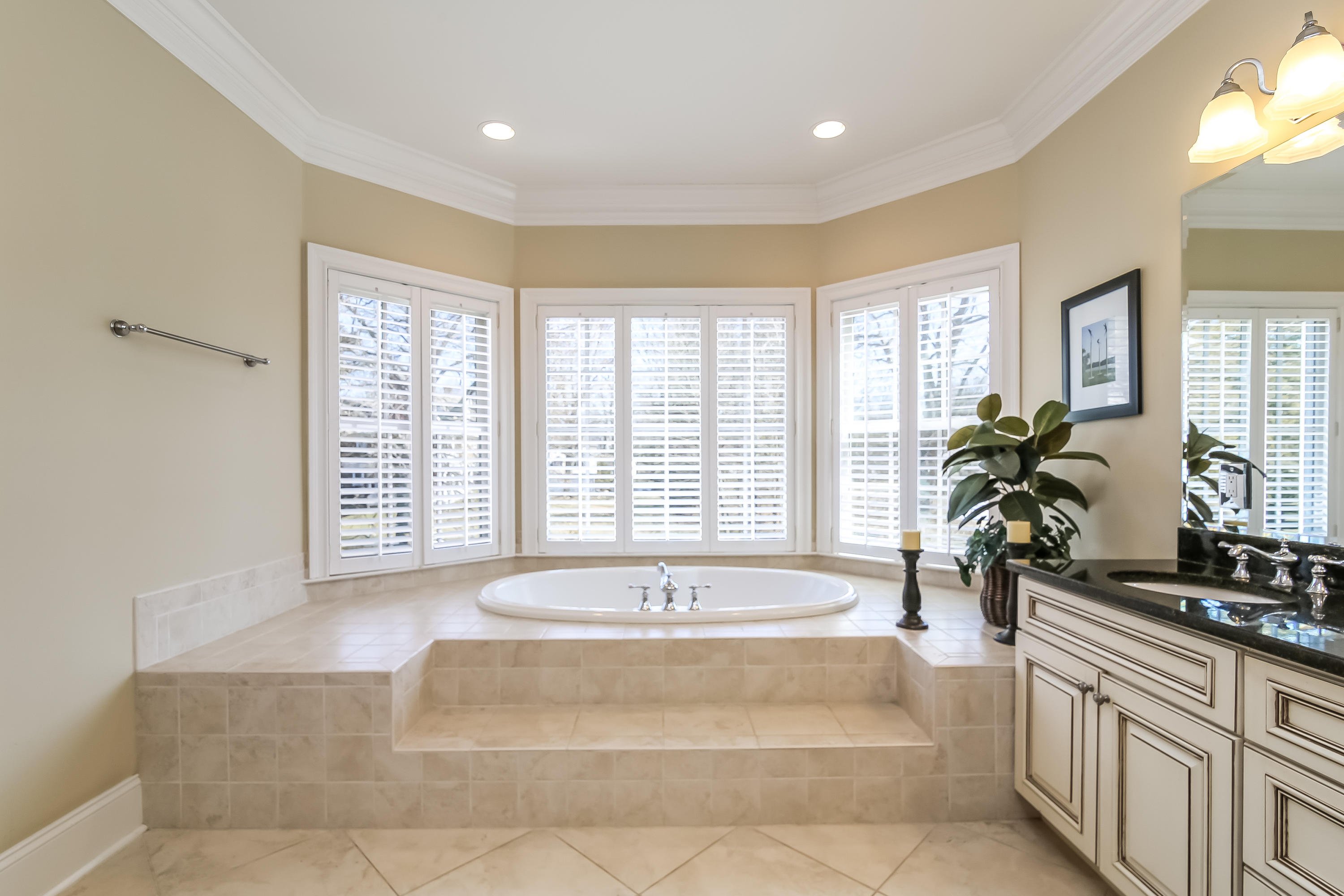 3 Bishops Gate Road Darien, CT 06820 - Photo 37 of 61 a spacious bathroom with a tub and sink