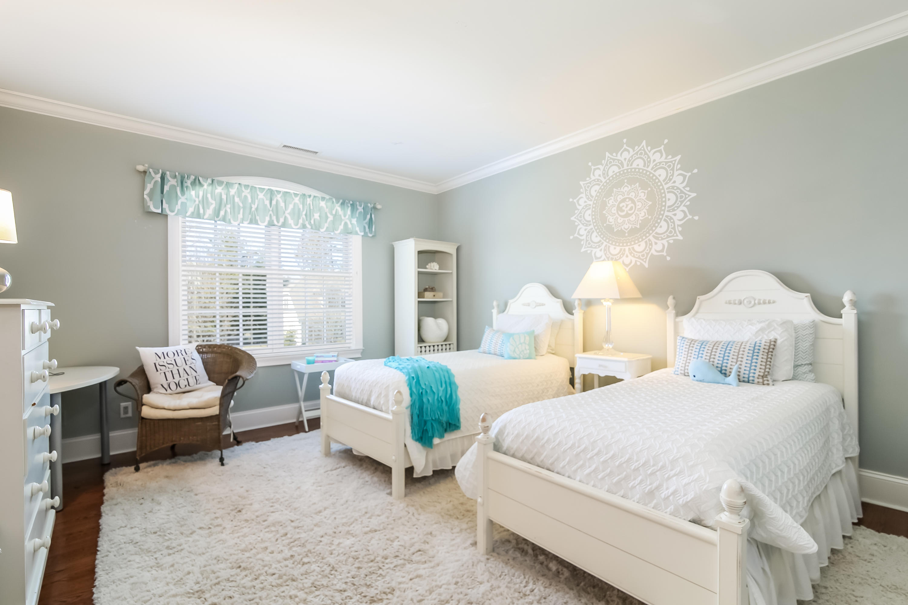 3 Bishops Gate Road Darien, CT 06820 - Photo 38 of 61 a bedroom with two beds and a large window