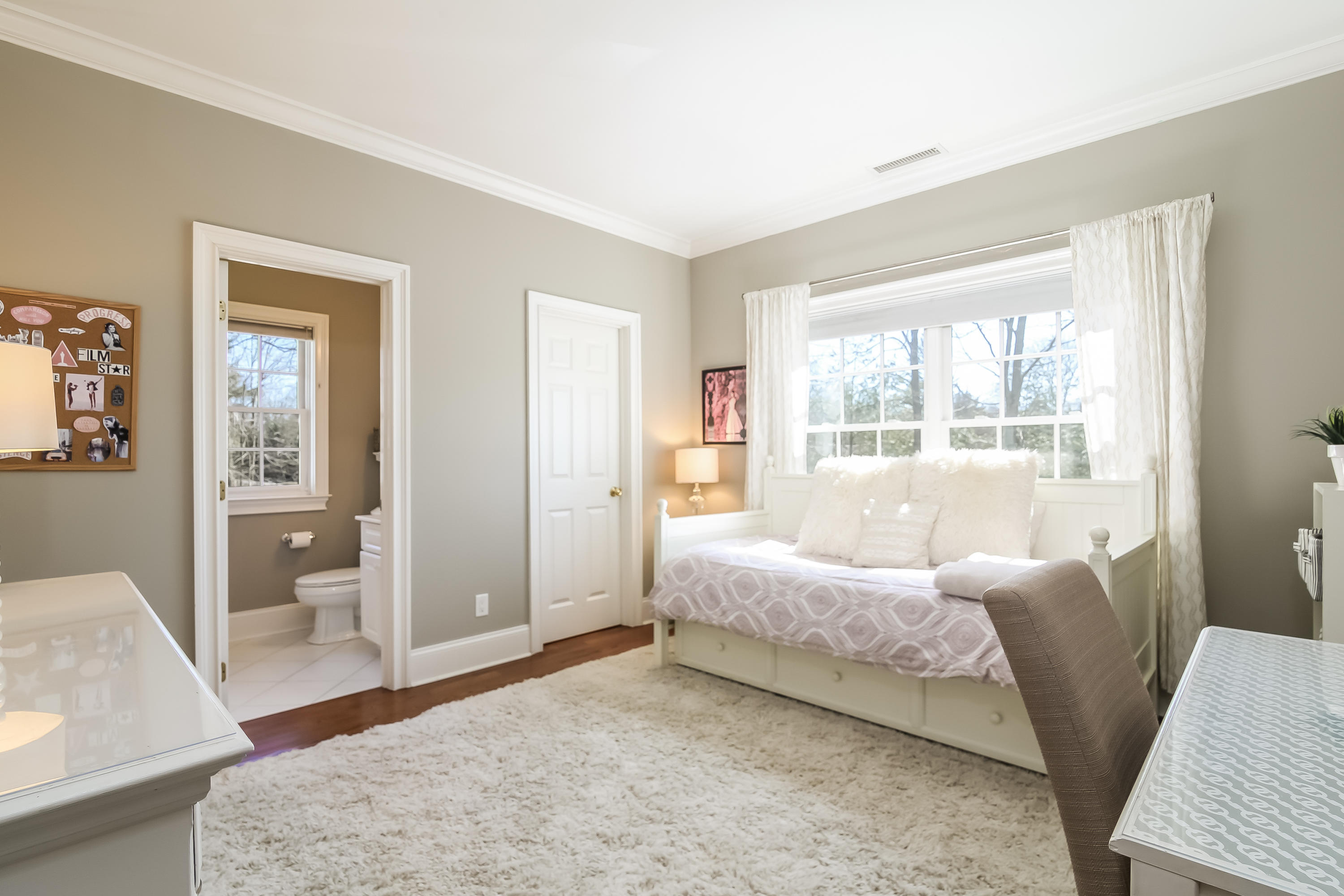 3 Bishops Gate Road Darien, CT 06820 - Photo 41 of 61 a bedroom with a bed and wooden floor