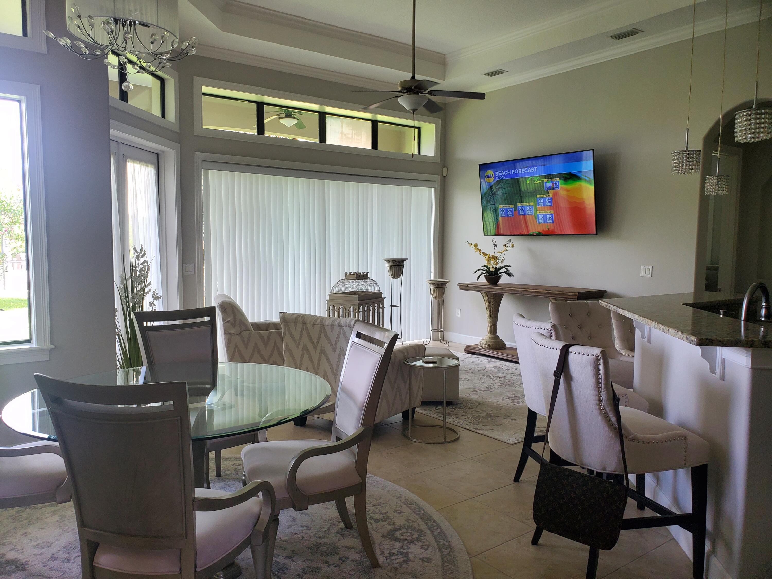 3179 Drummond Way Rockledge, FL 32955 - Photo 11 of 23 a view of a dining room with furniture and a window