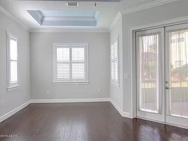 3179 Drummond Way Rockledge, FL 32955 - Photo 16 of 23 a view of a livingroom with wooden floor and a window