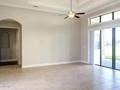 3179 Drummond Way Rockledge, FL 32955 - Photo 4 of 23 a view of an empty room with a window