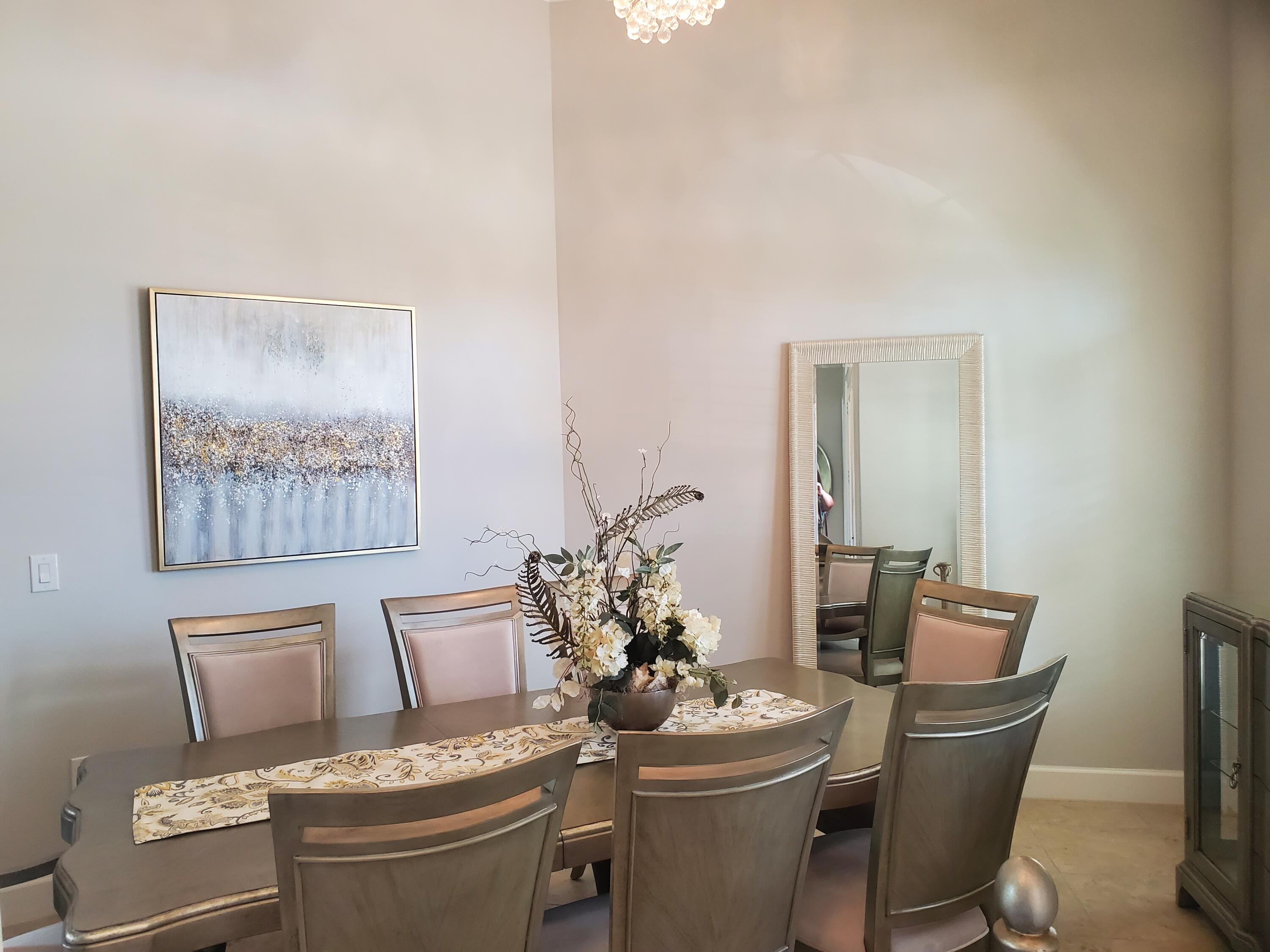 3179 Drummond Way Rockledge, FL 32955 - Photo 8 of 23 a room with furniture and wooden floor