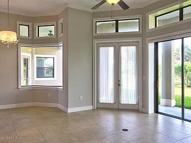 3179 Drummond Way Rockledge, FL 32955 - Photo 10 of 23 a view of an empty room with a window