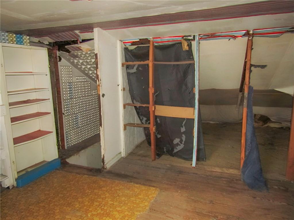 1401 South Elm Street Monaca, PA 15061 - Photo 20 of 26 a view of walk in closet with clothes and shoes