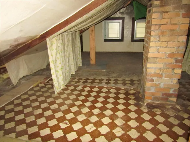 a view of a room with a furniture