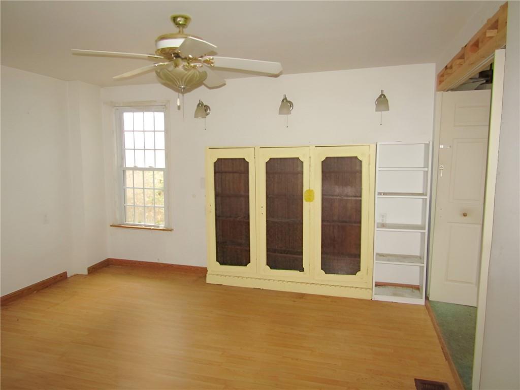 1401 South Elm Street Monaca, PA 15061 - Photo 9 of 26 a view of an empty room with a window