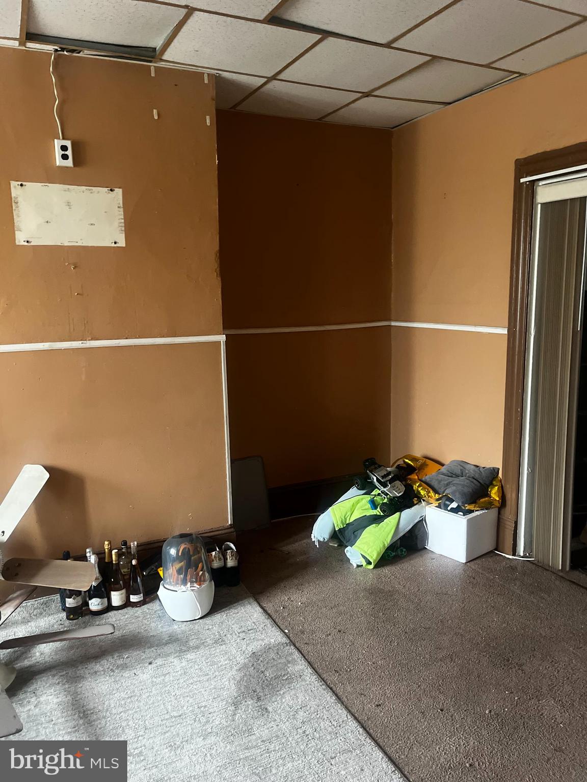 633 10th Street Northeast Washington, DC 20002 - Photo 10 of 11 a room with water heater and wooden racks