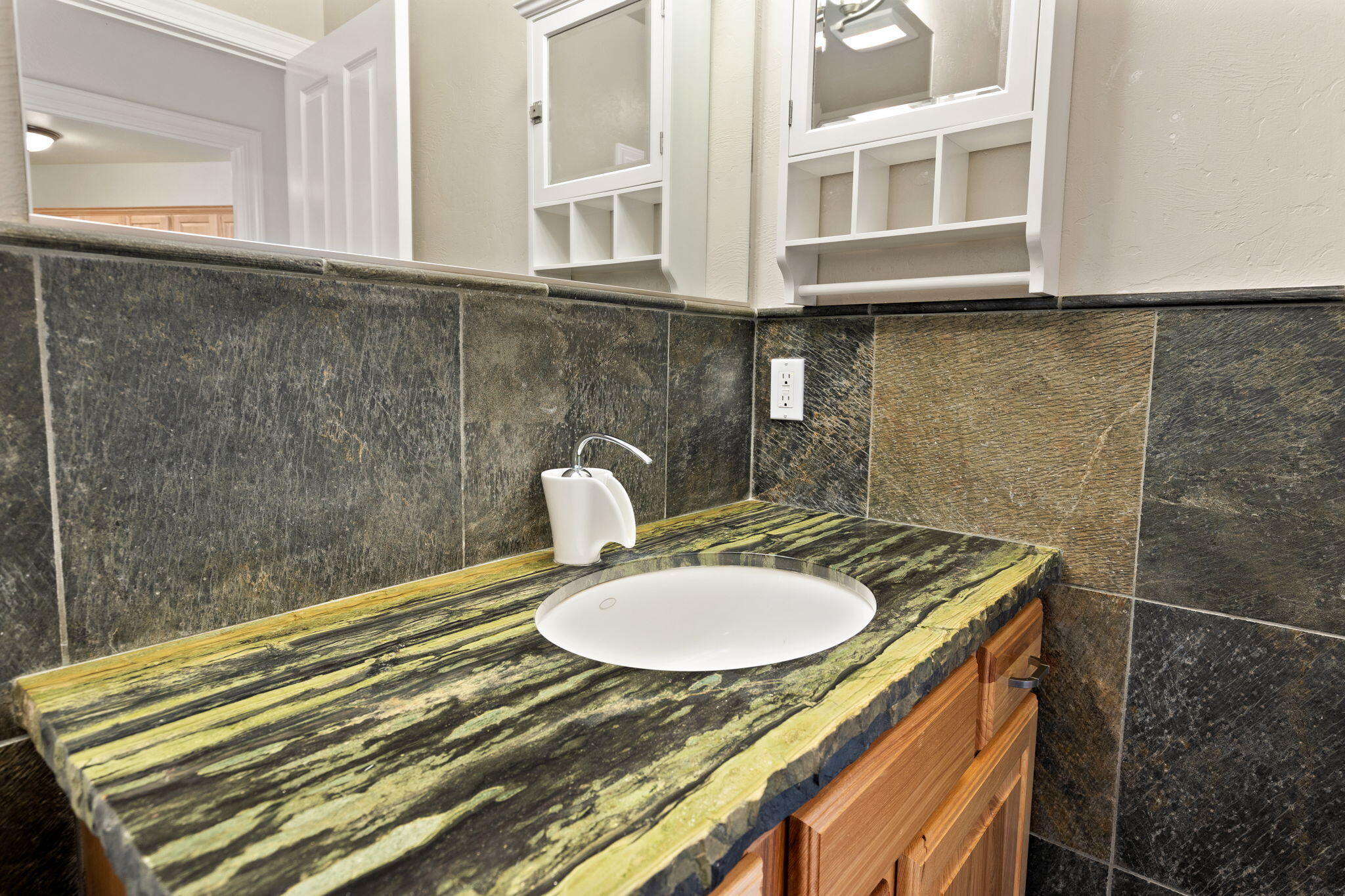 7304 North Applegate Road Grants Pass, OR 97527 - Photo 22 of 87 Main level Hallway Guest Bathroom beautiful granite natural edge