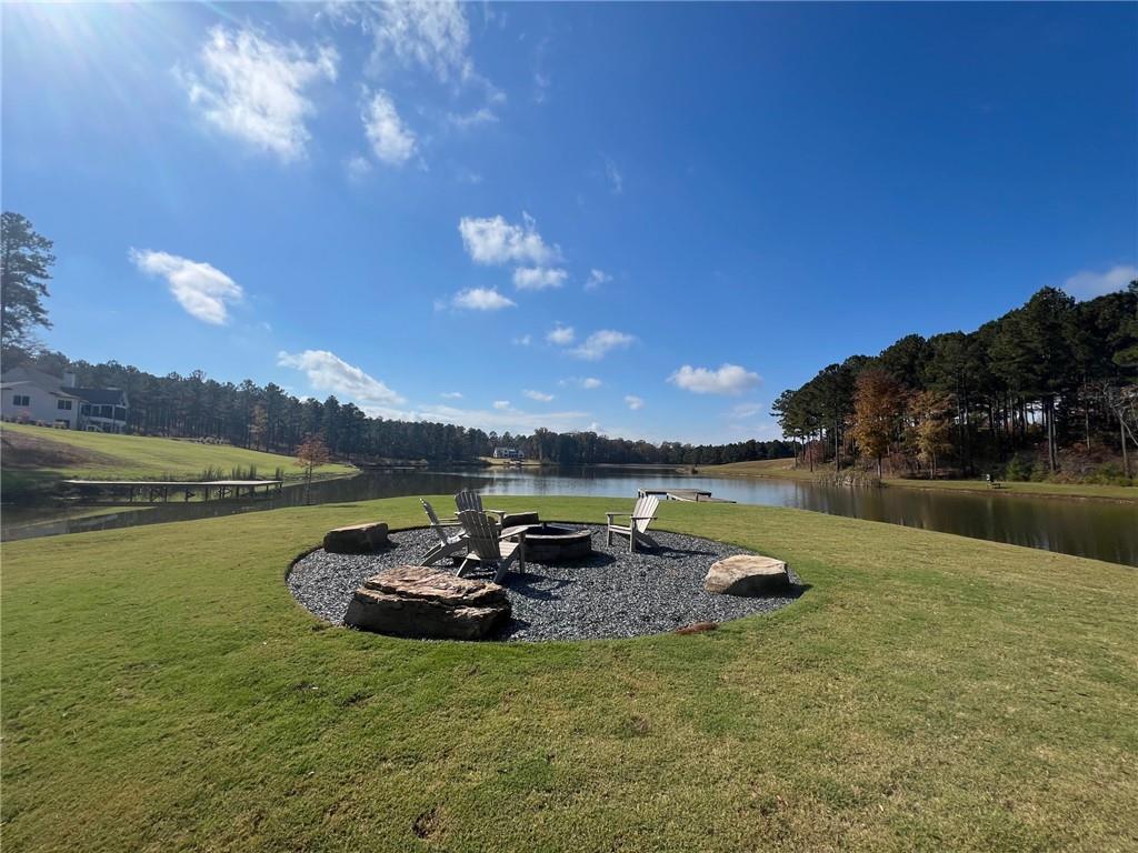 117 Overlook Drive Eatonton, GA 31024 - Photo 21 of 30 a lake view with a garden