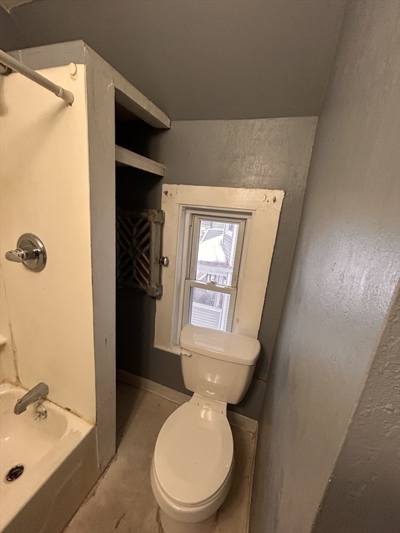 73 Lebanon Street Springfield, MA 01109 - Photo 14 of 19 a bathroom with a toilet sink and mirror