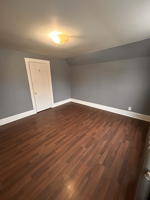 73 Lebanon Street Springfield, MA 01109 - Photo 15 of 19 an empty room with wooden floor and windows
