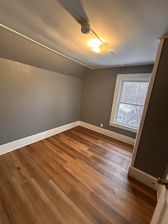 73 Lebanon Street Springfield, MA 01109 - Photo 17 of 19 a view of a big room with wooden floor and windows