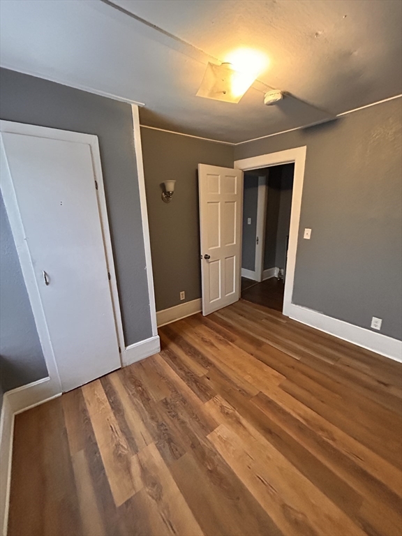73 Lebanon Street Springfield, MA 01109 - Photo 18 of 19 a view of empty room with wooden floor