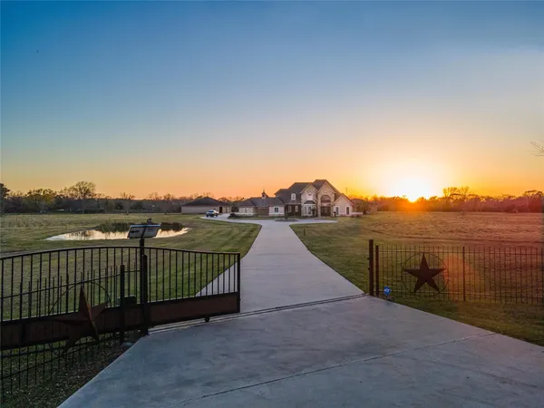 a view of a house with a swimming pool