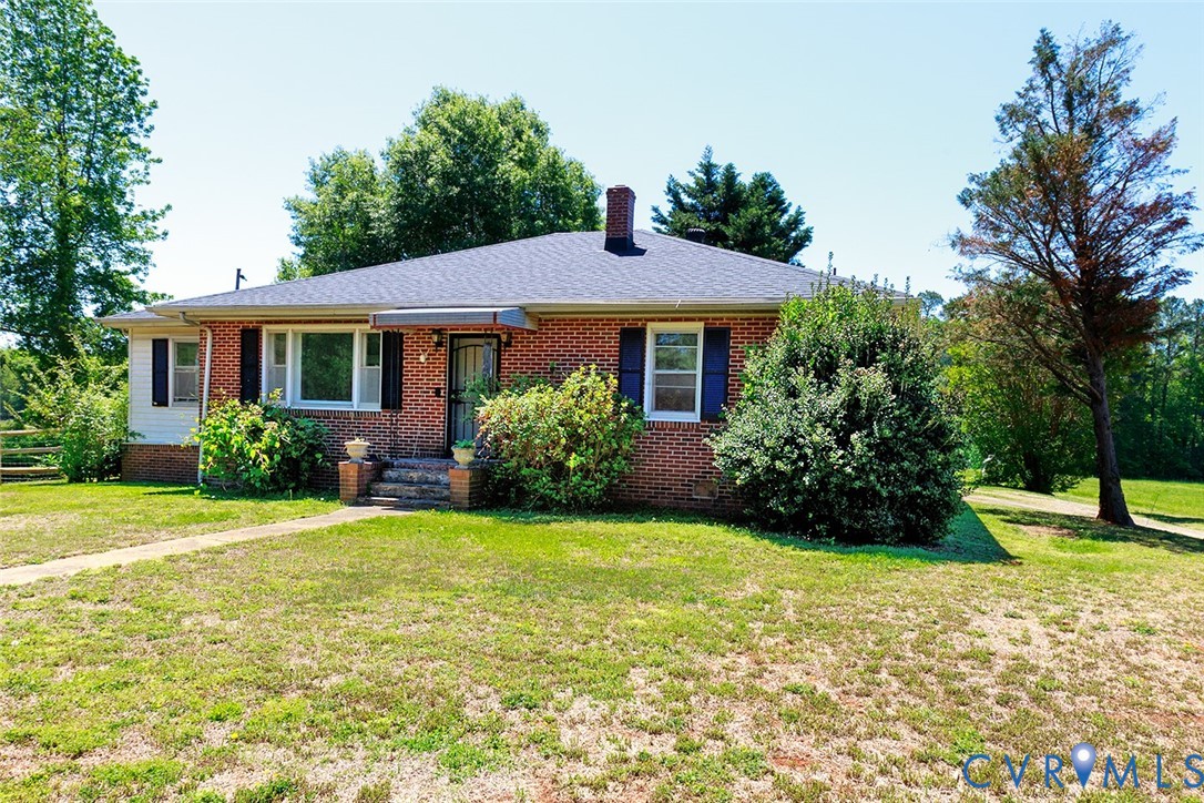 9903 Boze Road Ford, VA 23850 - Photo 2 of 45 a front view of a house with garden