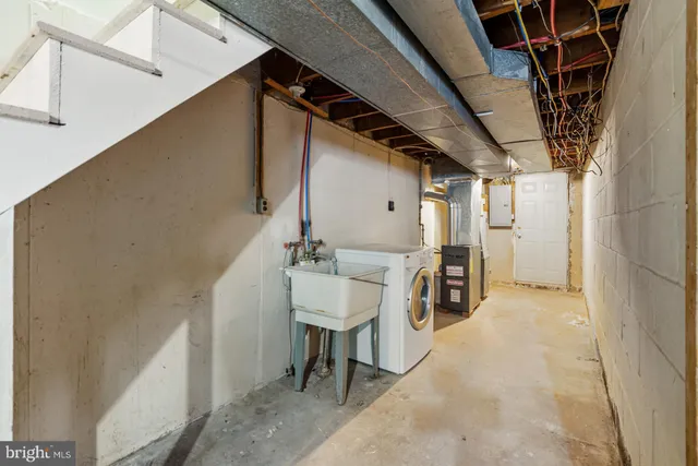 a view of a hallway with seating area