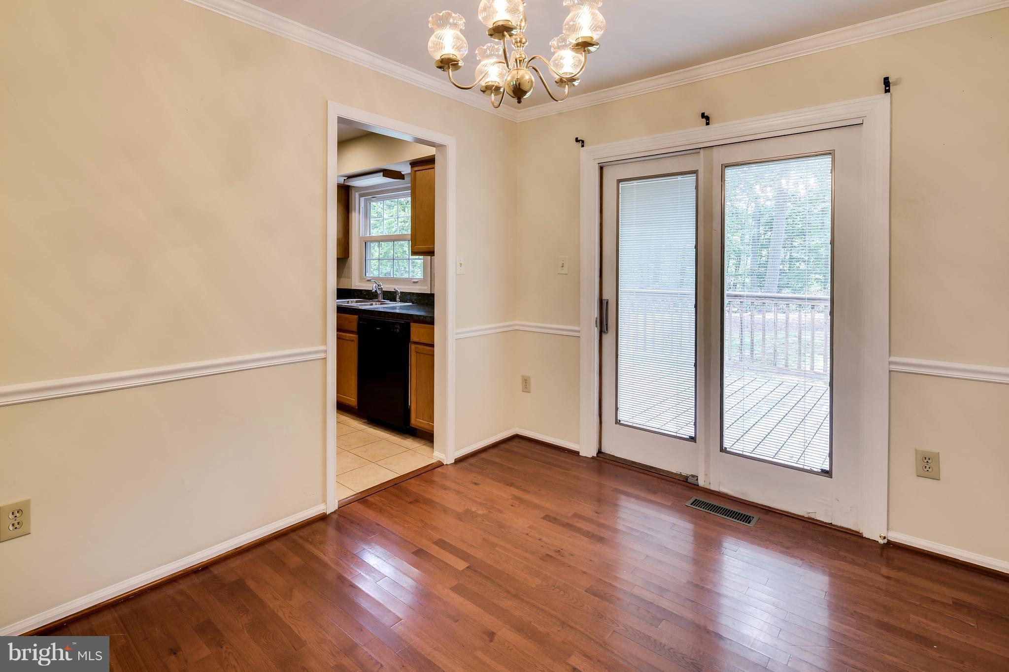 Dining Room- Sliding Glass Door To Deck + Backyard