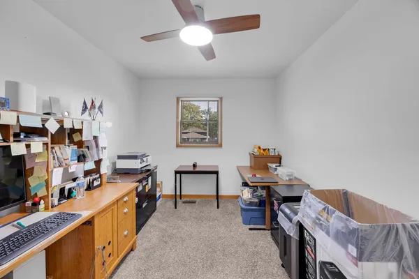 a room with furniture and a window