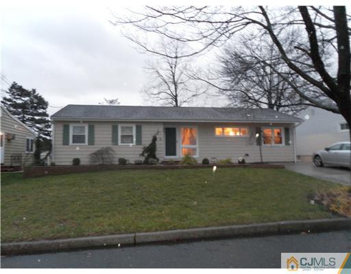 13 Lehigh Road Old Bridge, NJ 08859 - Photo 1 of 13 front view of a house with a yard