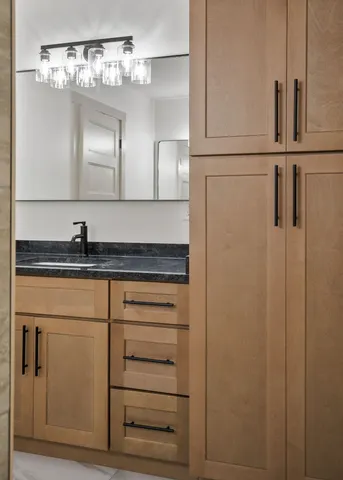 a close view of a dresser in the kitchen
