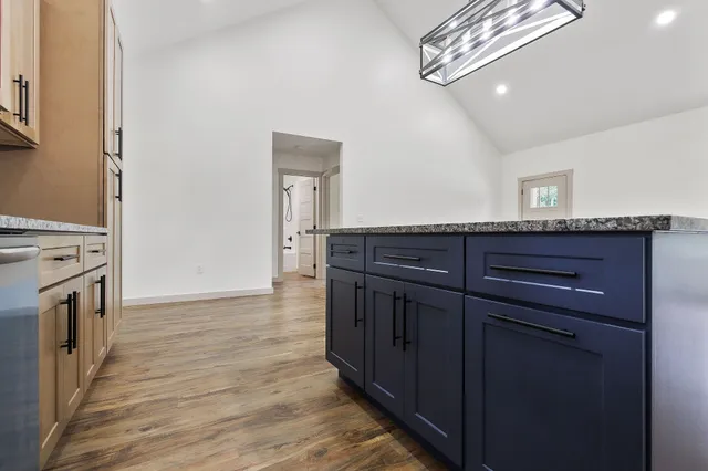a view of a kitchen from the hallway