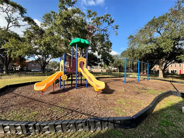 a view of outdoor space with swimming pool and sitting area