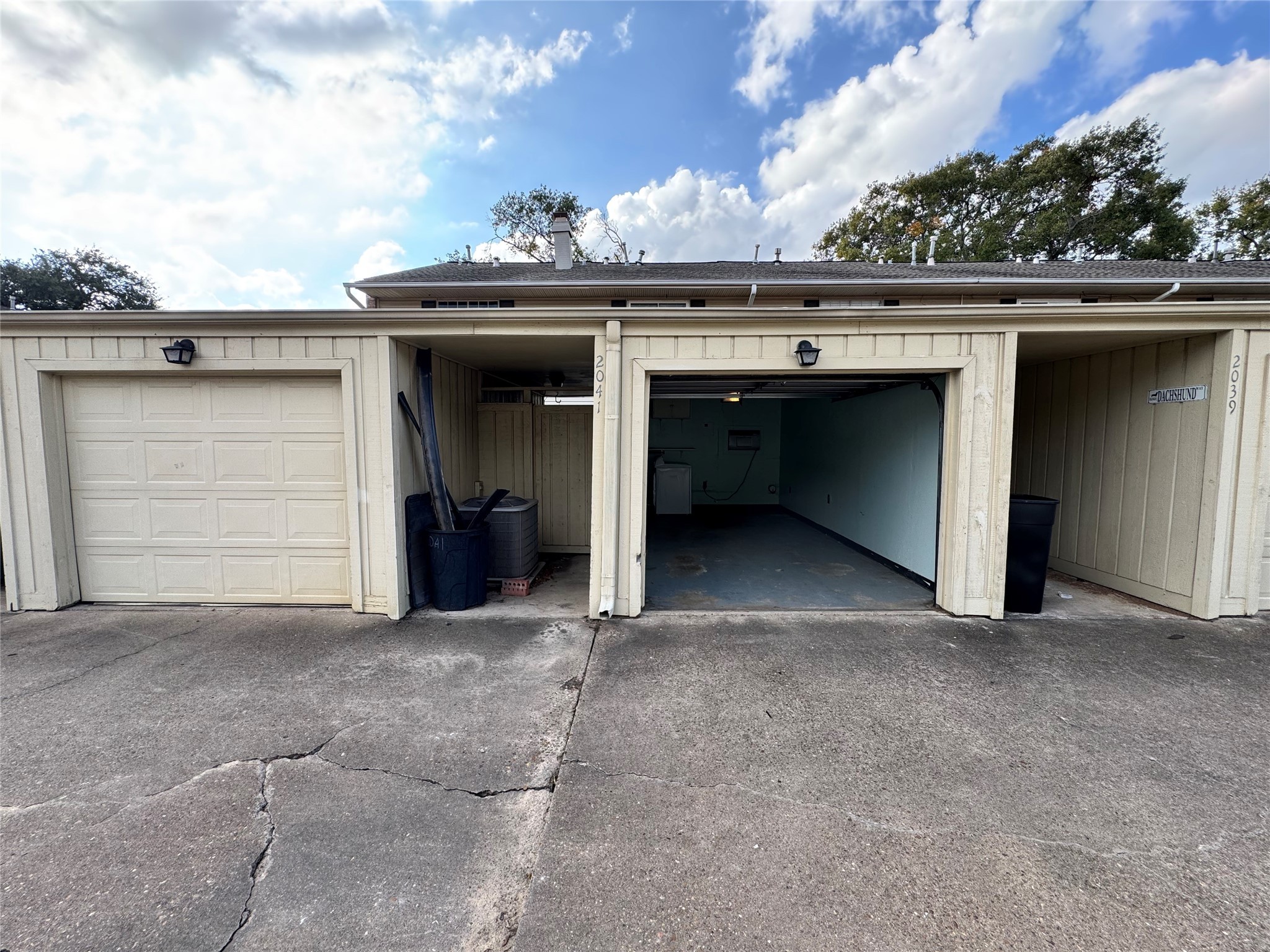 2041 Winrock Boulevard, Unit 157 Houston, TX 77057 - Photo 18 of 26 a view of a car garage