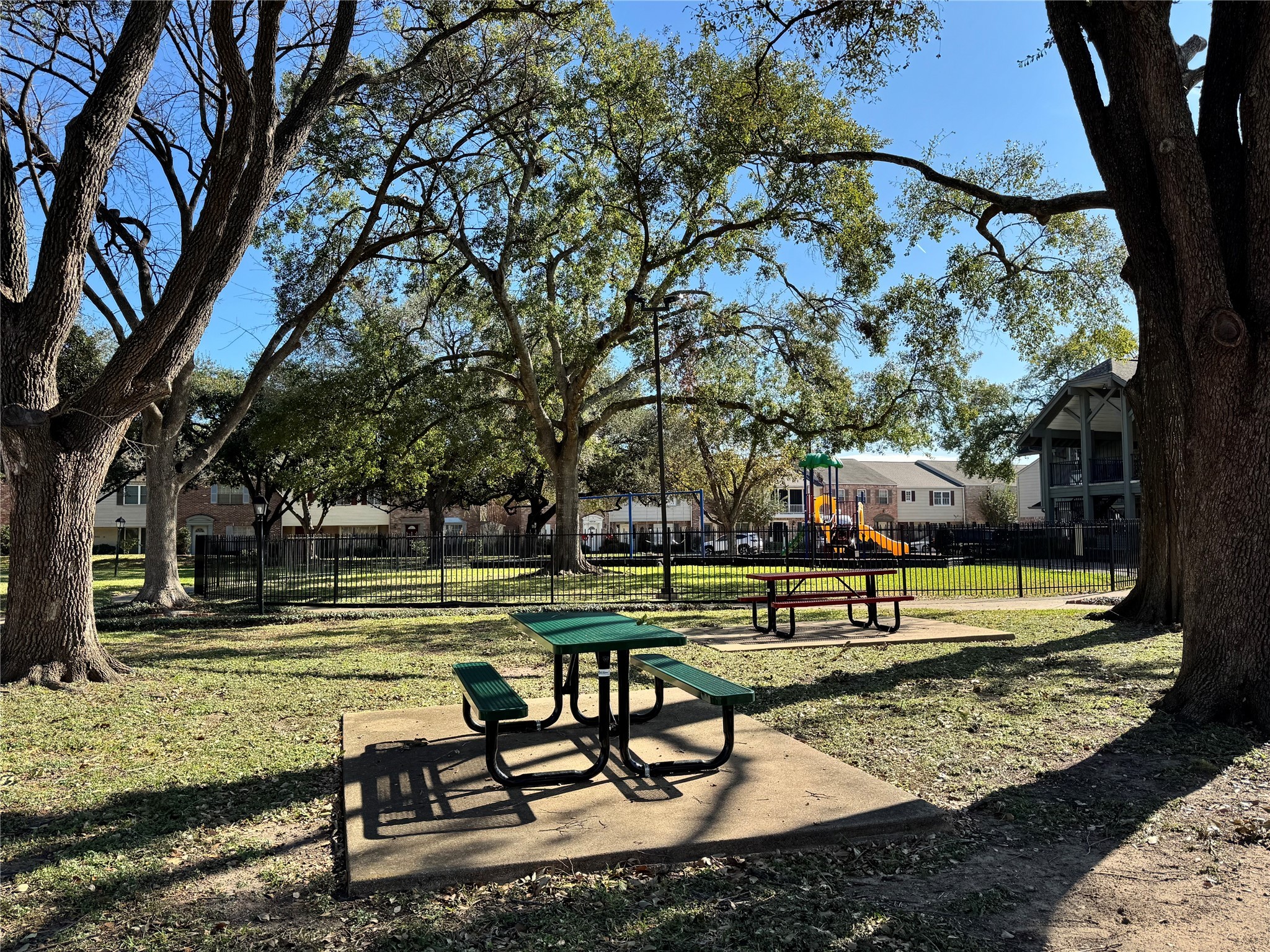 2041 Winrock Boulevard, Unit 157 Houston, TX 77057 - Photo 20 of 26 a view of a park with large trees