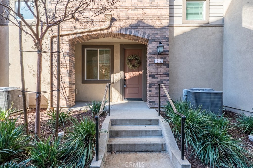 a front view of a house with a porch