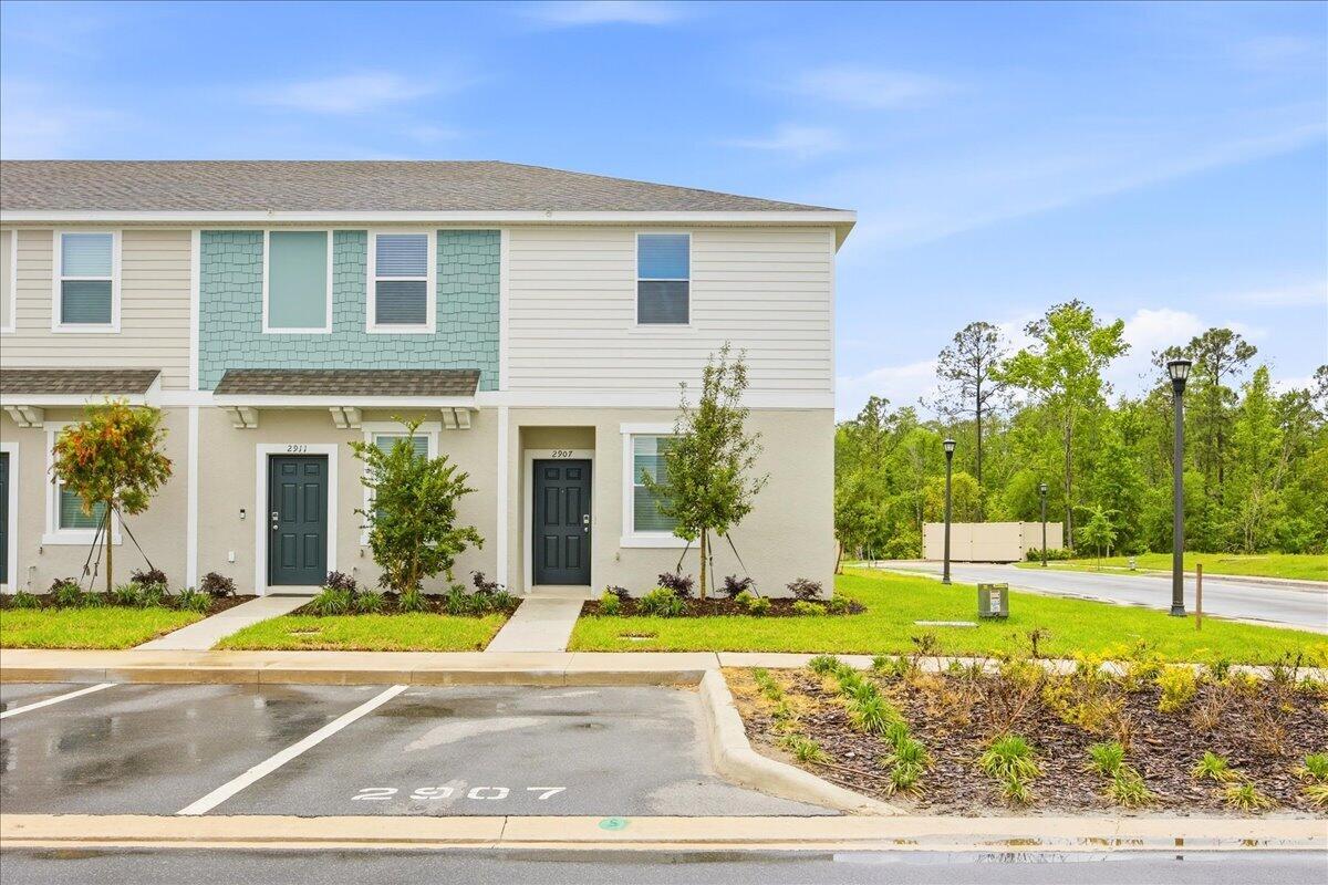a view of a house with a swimming pool